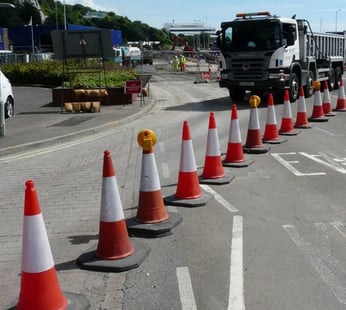 Photo of orange cones blocking a section of the road