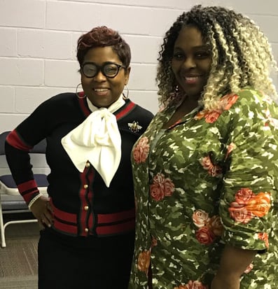 An educator and their ANet coach posing together